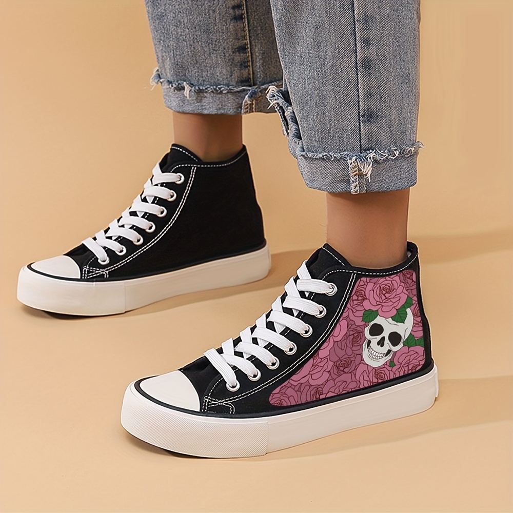 Skull converse hot sale high tops