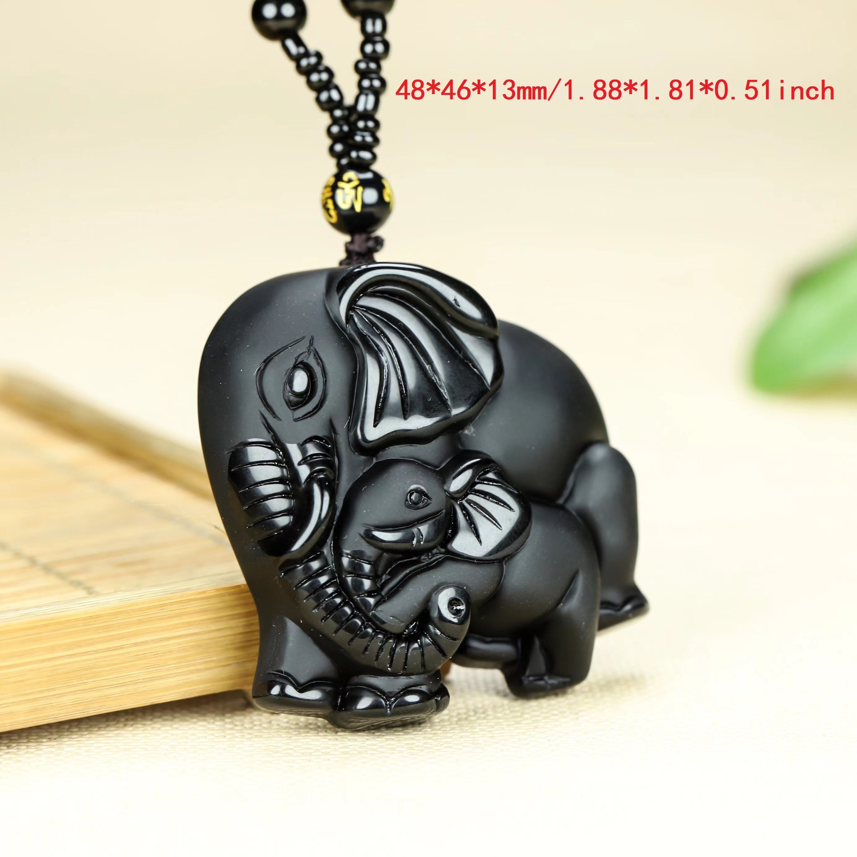 Black jade elephant deals pendant