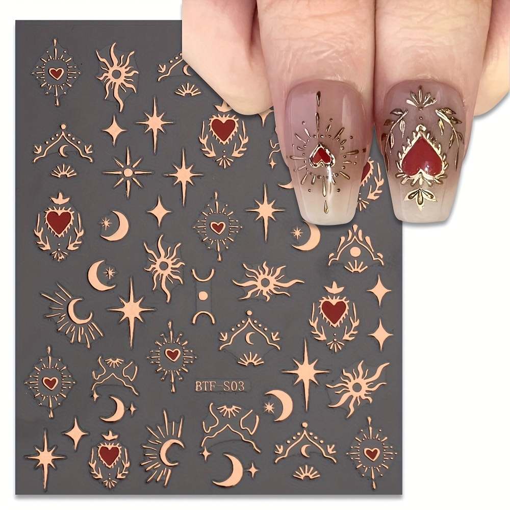 Gold moon and stars nail tattoos