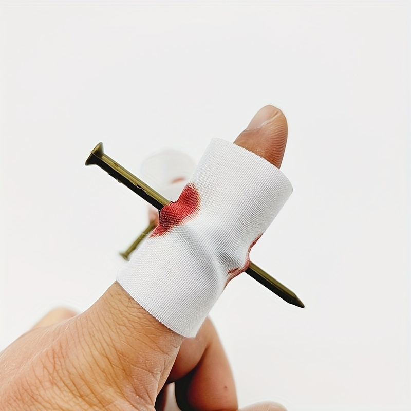 clou dans le doigt avec bandage