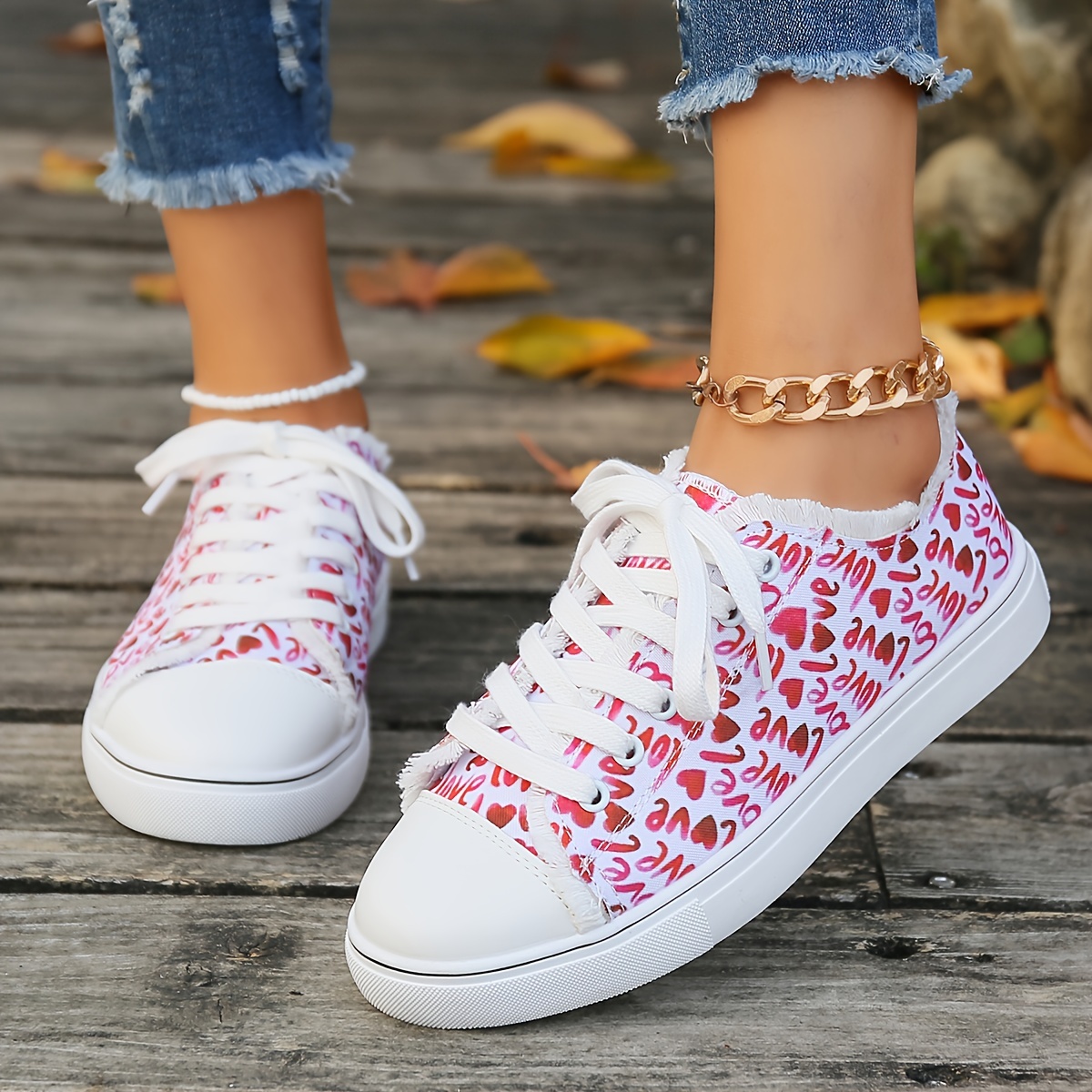 Women's sneakers with hearts print from Coach - مون اوتليت Moon