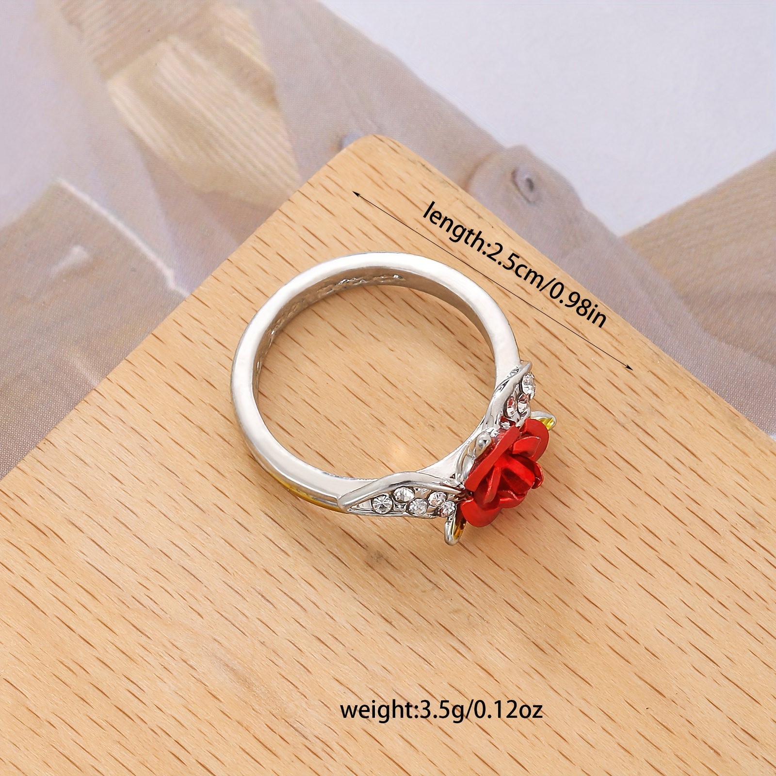 Anillo con rosa online roja