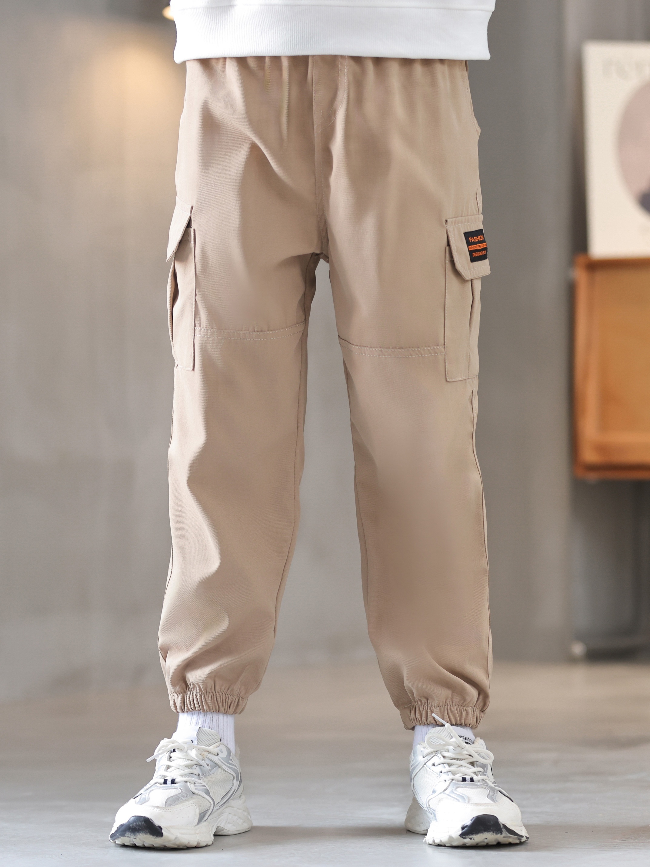ASOS DESIGN oversized cargo trouser with multi pocket in khaki