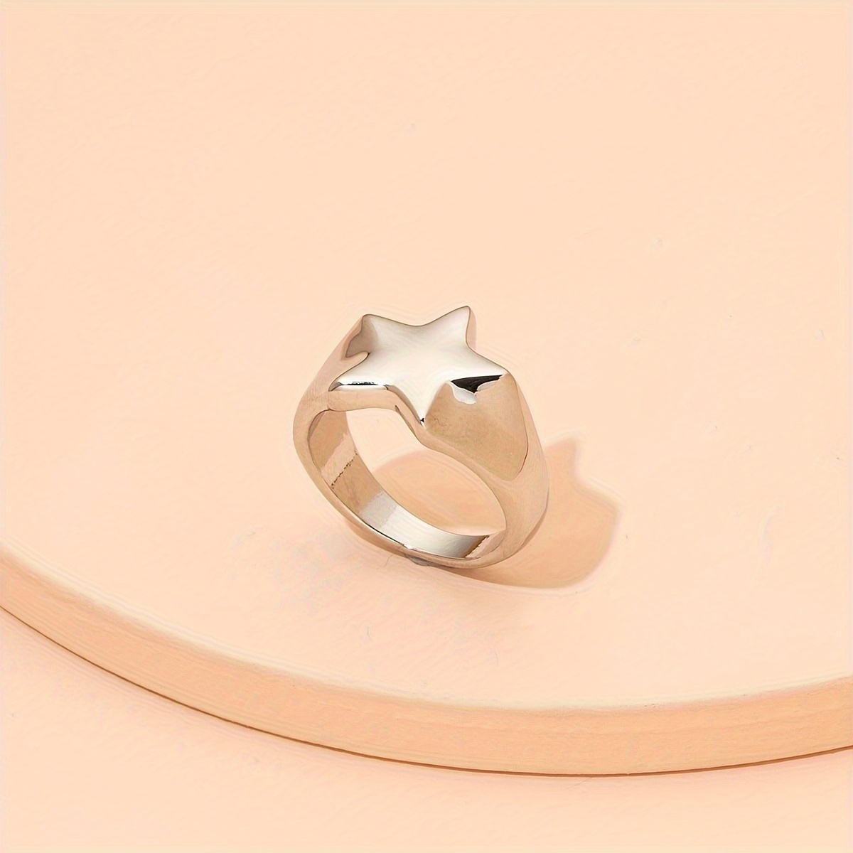 

A Stylish And Minimalist Women's Ring In Golden Color.