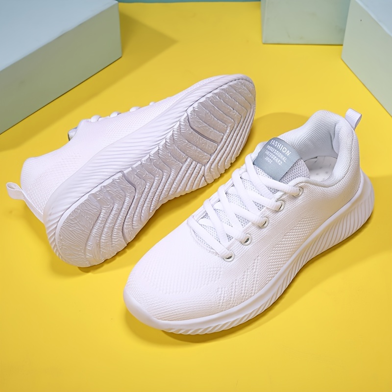 Solid white hot sale tennis shoes