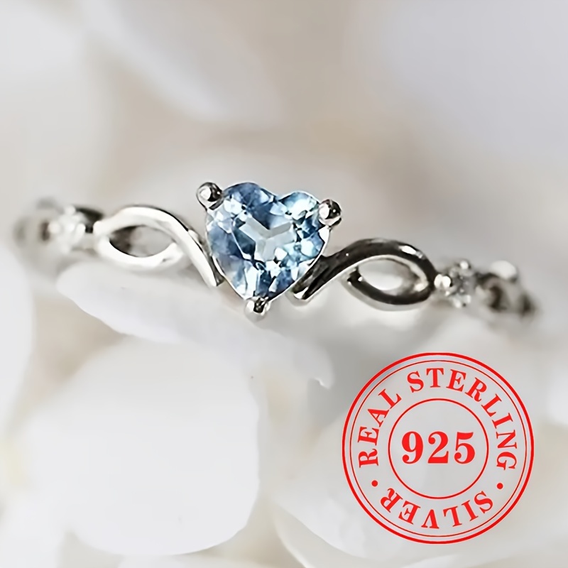 

A 1.7g S925 Sterling Blue Synthetic Zirconia Heart Engagement Ring Suitable For Women, Weddings, Engagements, Parties, , Elegant Jewelry Accessories, And Gifts For Valentine's Day Or Anniversaries.