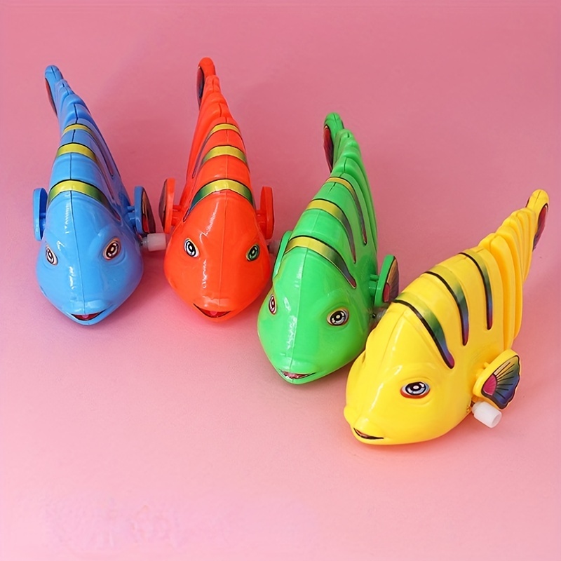 12 juguetes de peces de plástico para enrollar, juguetes de peces de  dibujos animados oscilantes, juguetes creativos de cuerda para niños,  juguetes