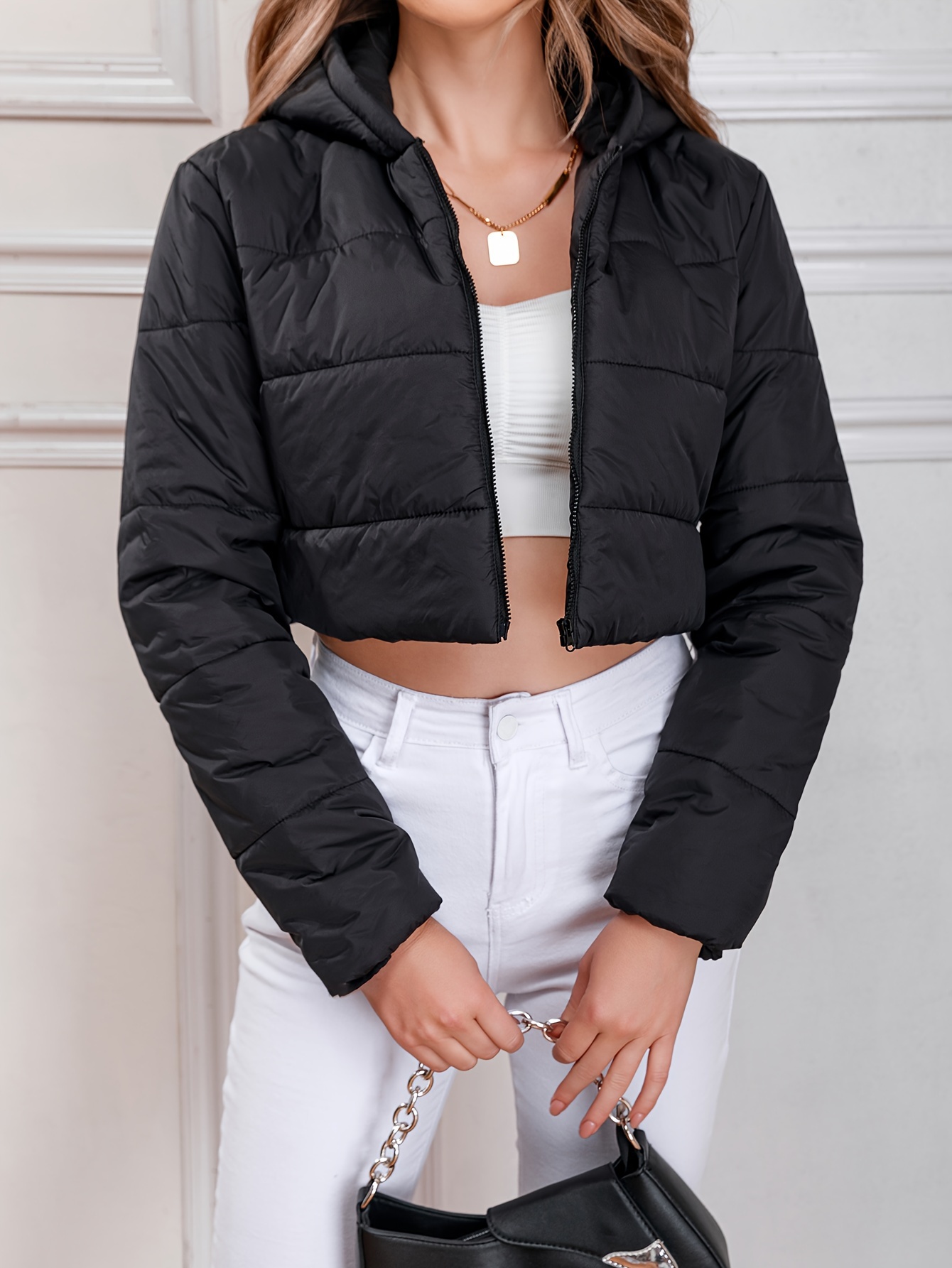 Black hooded cropped store puffer