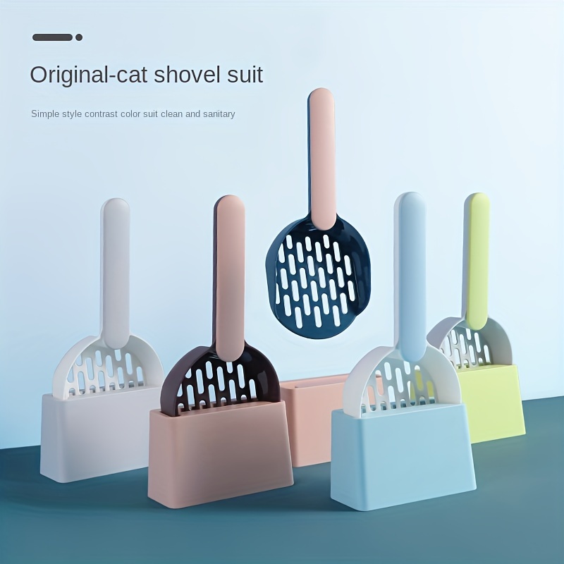 Cat litter box outlet scoop holder