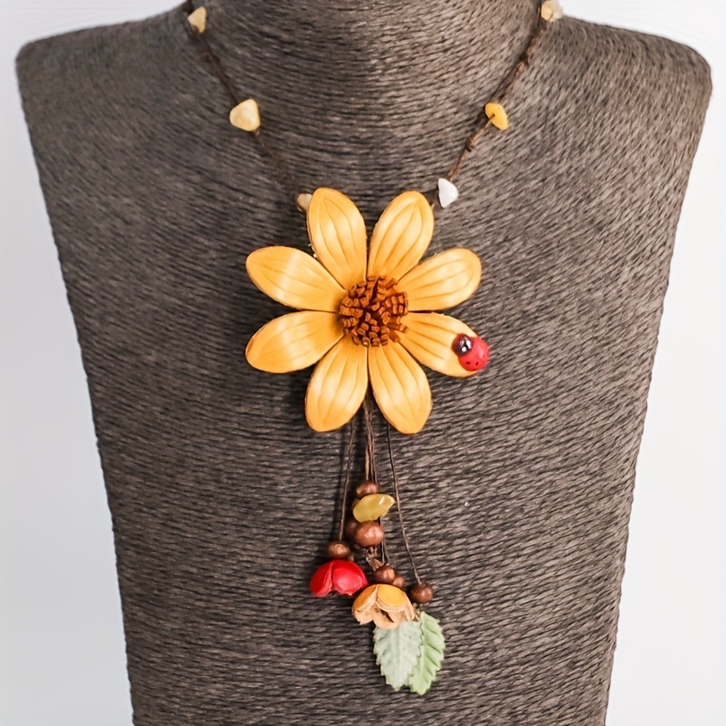 Elevate Your Look with This Stylish Tassel Leather Flower Pendant Necklace!