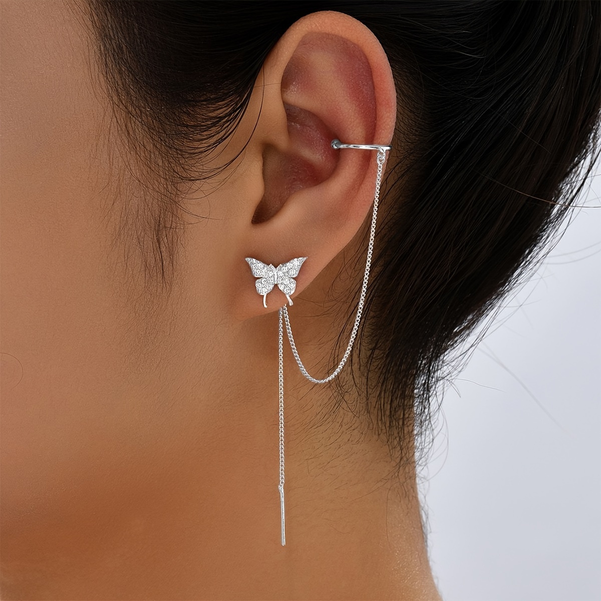 elegant     ear cuff with sparkling zirconia stones and tassel accents chic c shaped ear clip for women ideal for weddings and daily wear details 2
