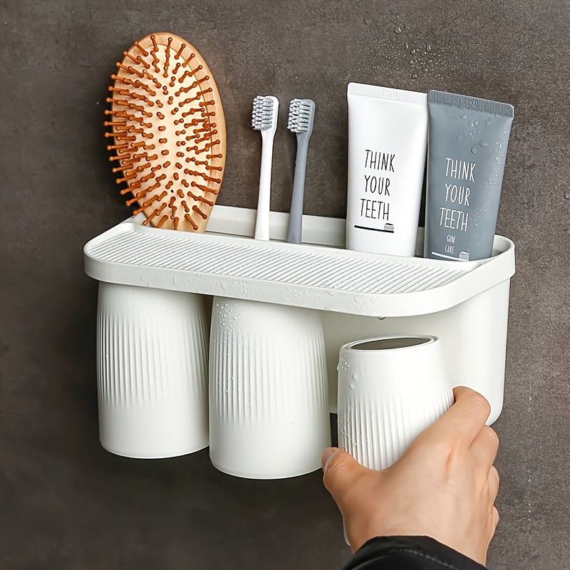 Soporte para cepillos de dientes montado en la pared, kit de exprimidor  automático de pasta de dientes, soporte magnético para cepillos de dientes