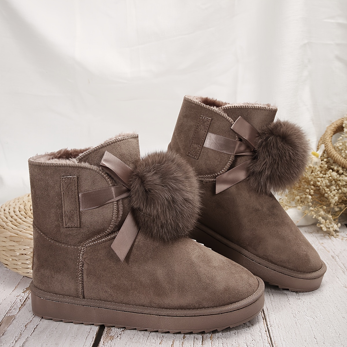 Uggs boots with fur on sale balls