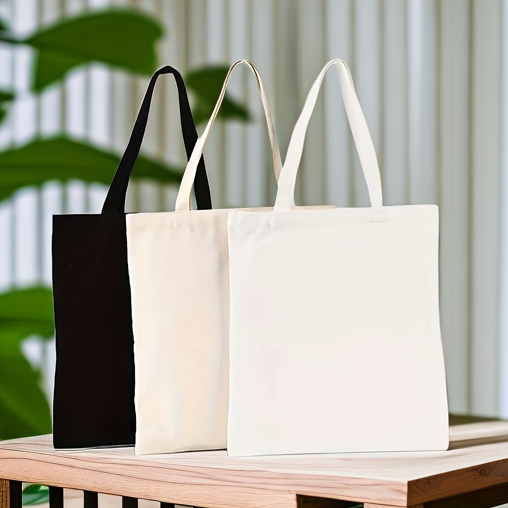 Paquete de 10 bolsas de tela con asas hechas de tela reciclada, gruesa y  resistente de 38cm x 48cm aptas para personalizar, sublimar, bordar y pintar.  Bolso tote mayoreo. : : Ropa