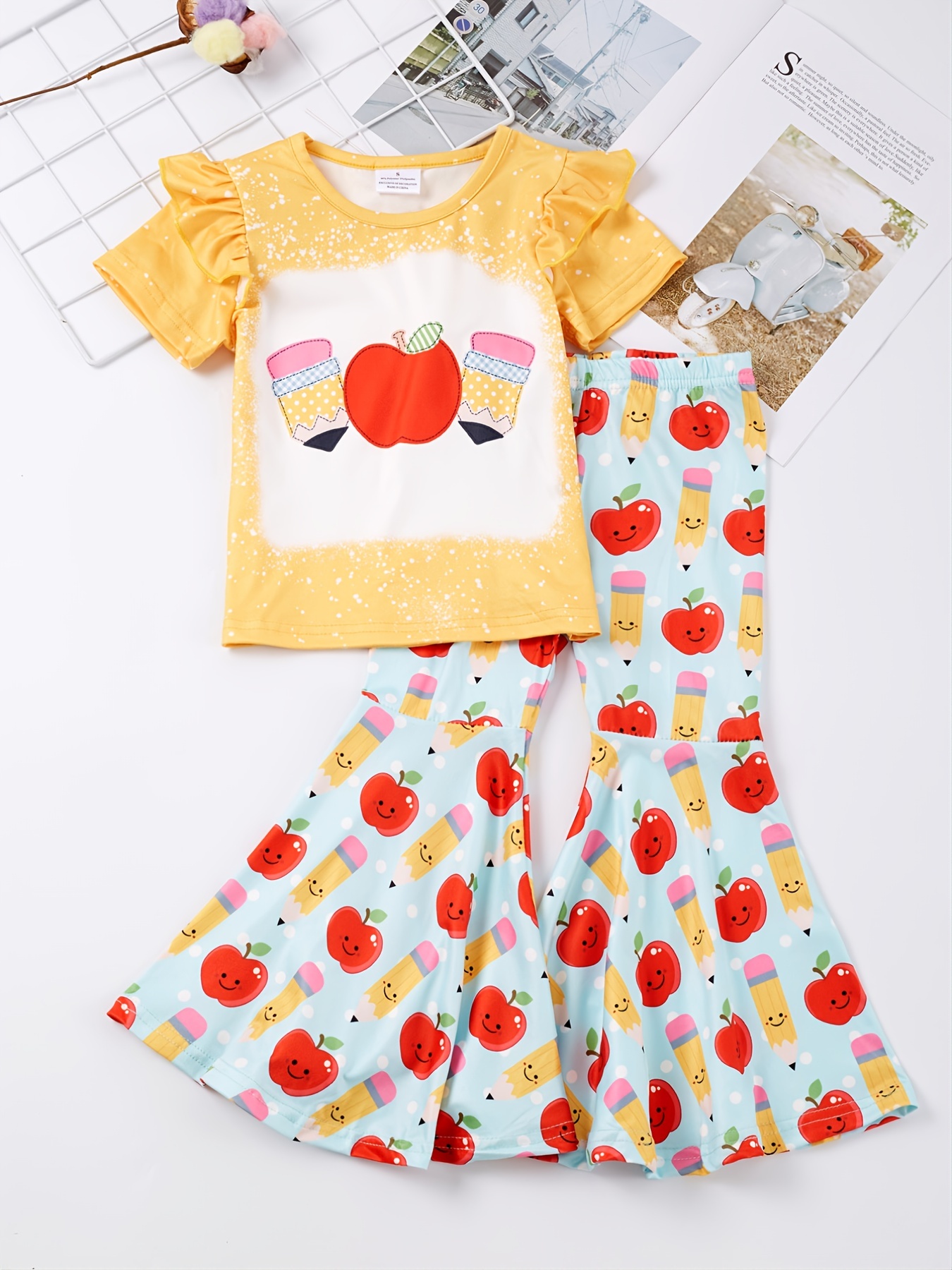 Camiseta con volantes en las mangas y frutas amarilla bebé niña