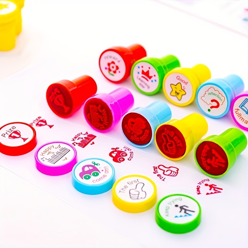 Amosfun 40 piezas de sellos infantiles de juguete para profesores, sellos  de manualidades para niños, sellos de dinosaurio autoentintados, sellos de
