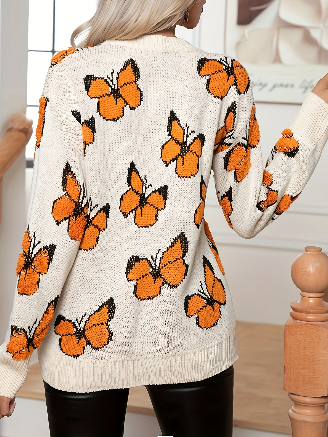 Sweater with outlet butterfly