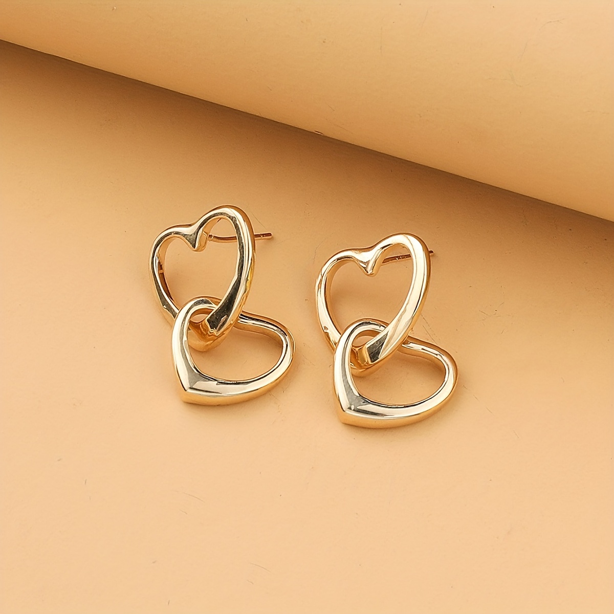 Interlocking 2024 heart earrings