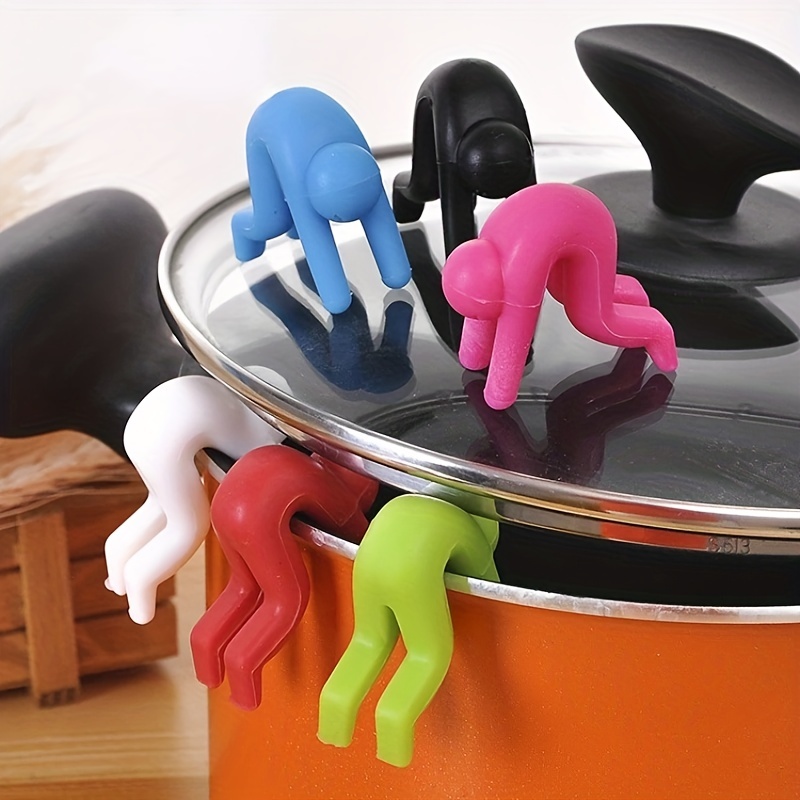 Creative Man Shape Pan Lid Lifters Holder Spill Poof Silicone for Pots &  Pans Lid Stand Heat Resistant Holder Bl12224 - China Pot Lid Holder and  Silicone Lid Pot Lifter price