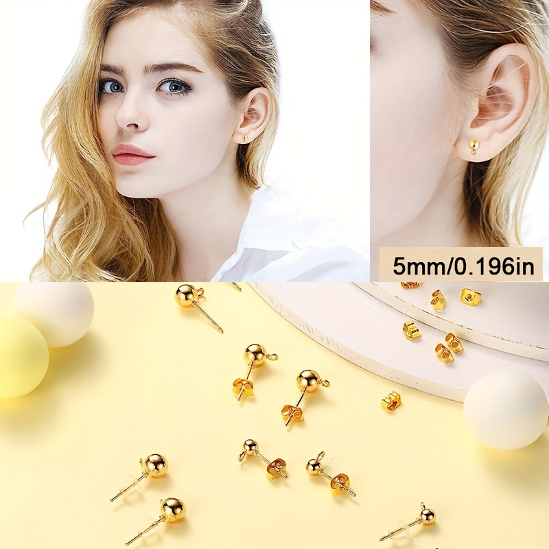 Sigma star and moon gold plated earrings for 2 holes in the ear  Gold  earrings  KOBRA copenhagen ApS