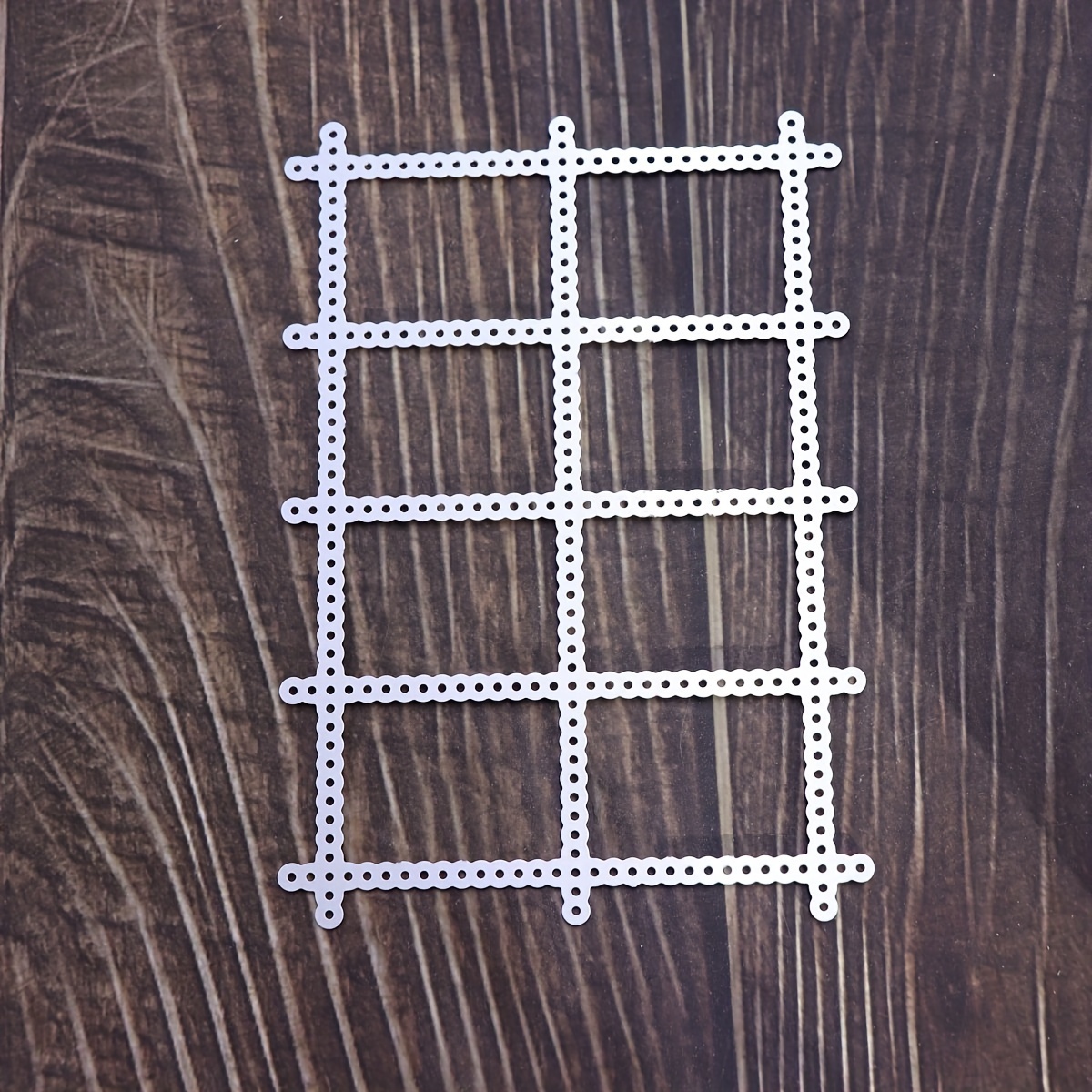 A Metal Cutting And Embossing Die For Stamps