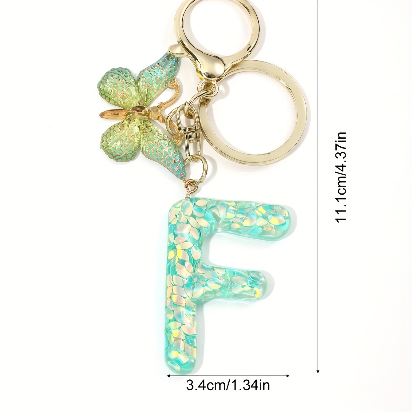 Crafty Angel Art F - Letter - Initial Resin Keychain Translucent Letter F with Sea Shells Inside It and Purple Party Glitter on The Front with A Beaded Charm and A Paw