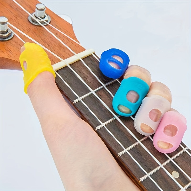 4pcs Guitare Guitare doigtier Fingertip Protection silicone cordes
