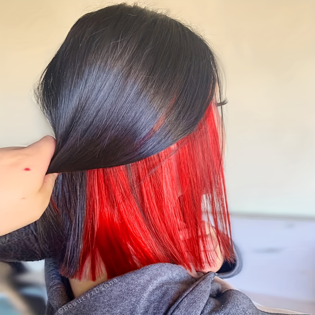 red highlights underneath hair