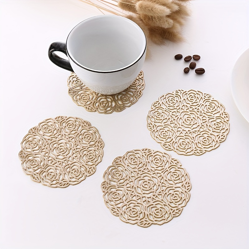 

4pcs, Placemats, Golden Coffee Cup Mats, Creative Hollowed-out Rose Shape Coaster, Household Decorative Meal Coaster, Pvc Heat Insulation Bronzing Coaster, Coffee Non-slip Placemat, Dining Table Decor