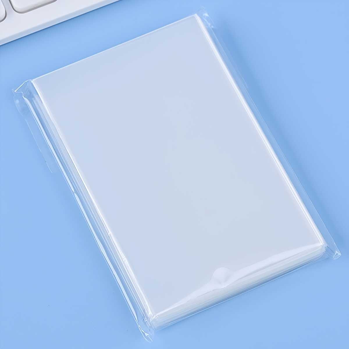 100 sleeves pour cartes 66 x 92 mm pochettes plastiques transparente