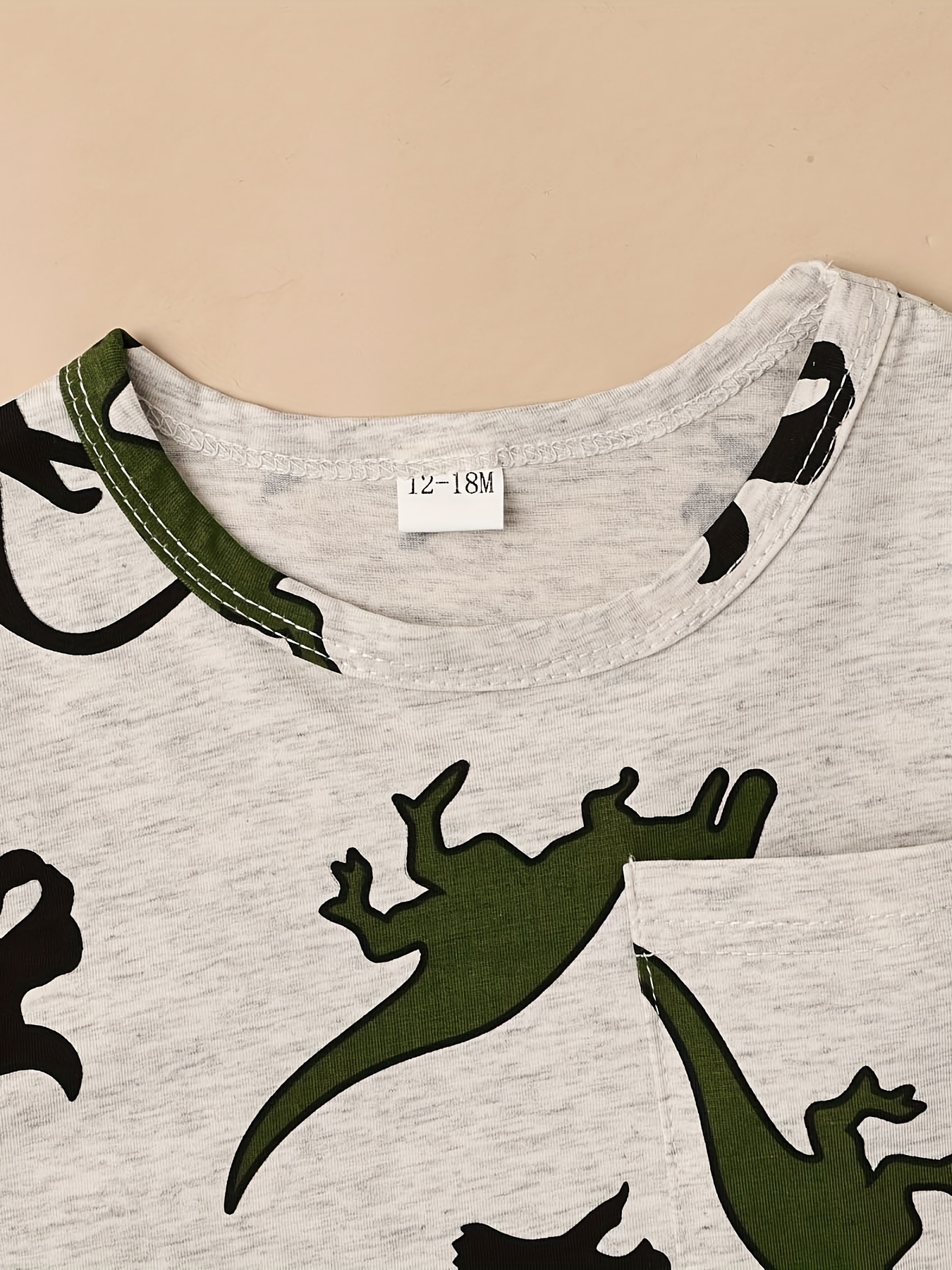 Camiseta dinosaurio best sale niño zara