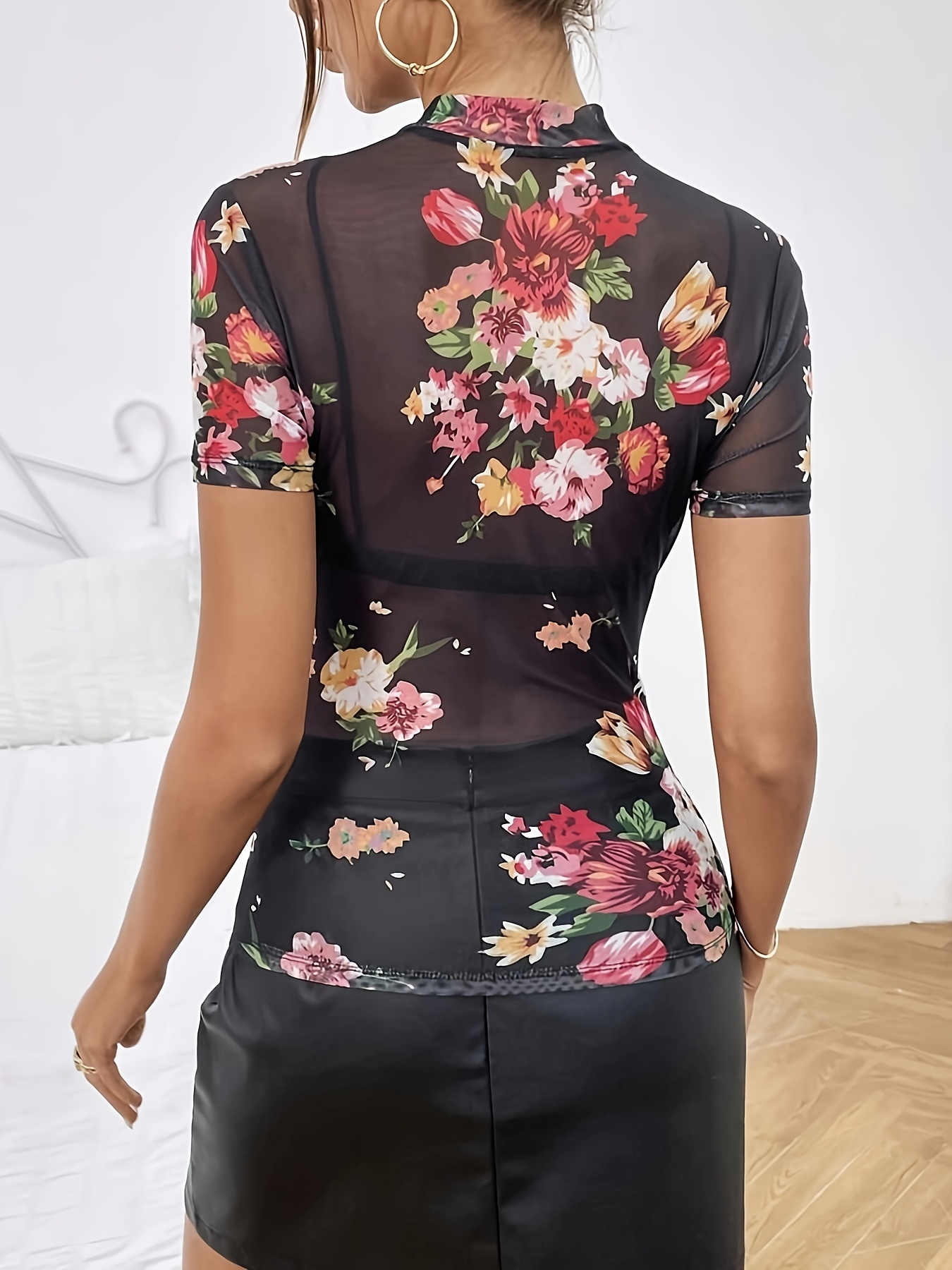 Black mesh top with floral print