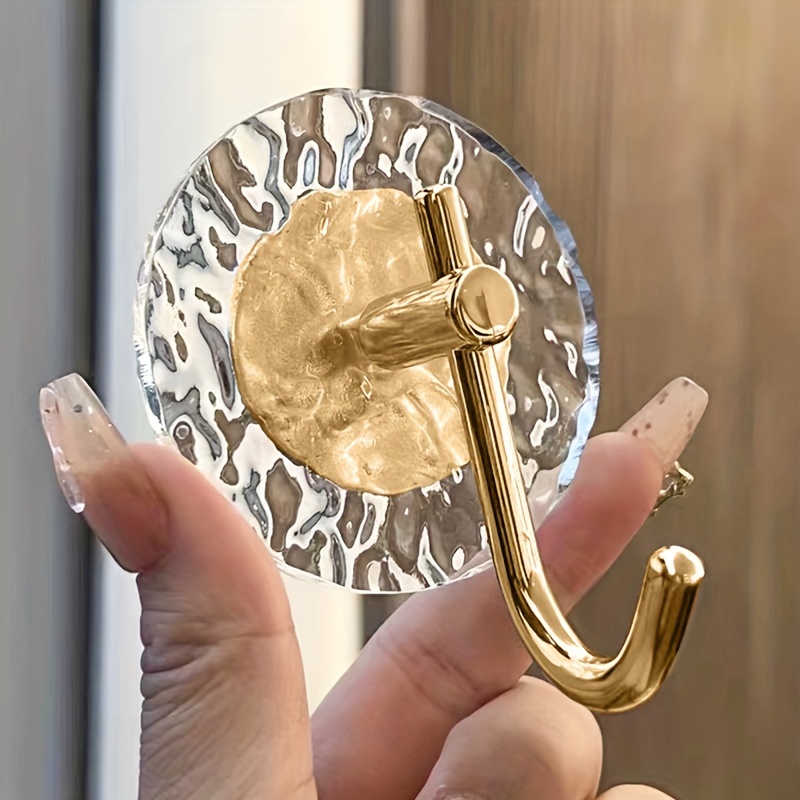 

1pc Bathroom Hook, Kitchen Hook, Clothes Hook Behind Door, Wall Hook, Transparent Plastic Material, No Need For Punching, Golden Water Ripple Pattern, Glacier Pattern