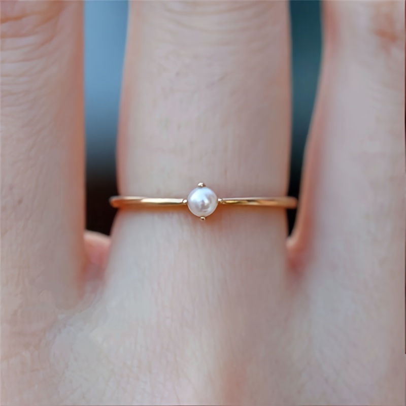 Minimalist pearl deals ring