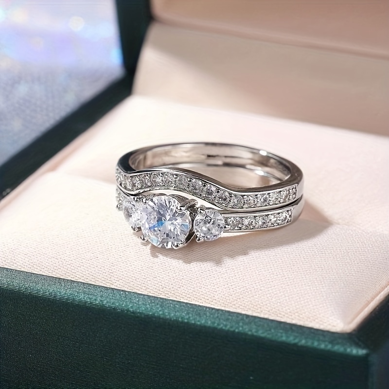 Rings : Floret Design Three Stone Princess Cut CZ Ring