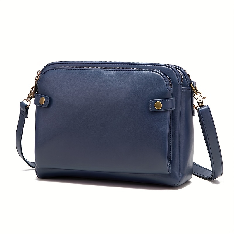 Tria Real Leather Cross body Bag in Blue - MISC