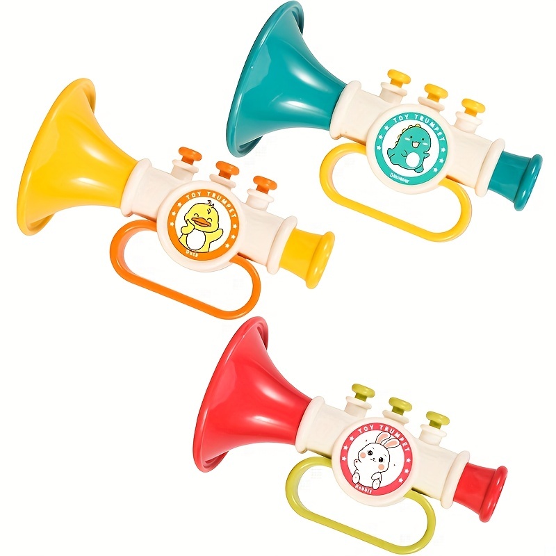 Trompeta para niños hecha de plástico de color: fotografía de