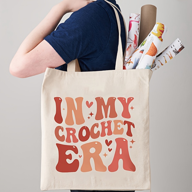 

1pc In My Crochet Era Pattern Tote Bag, Canvas Shoulder Bag For Travel Daily Commuting, Women's Reusable Shopping Bag, Best Gift For Xmas, Trendy Folding Shoulder Bag