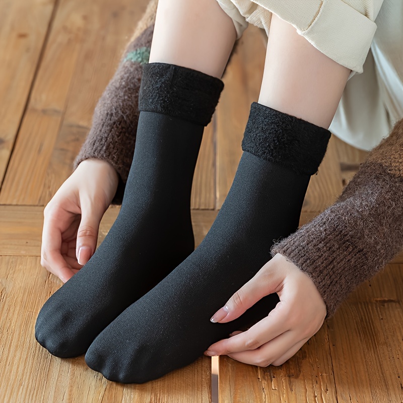 Calcetines lisos negros de lana suave para mujer