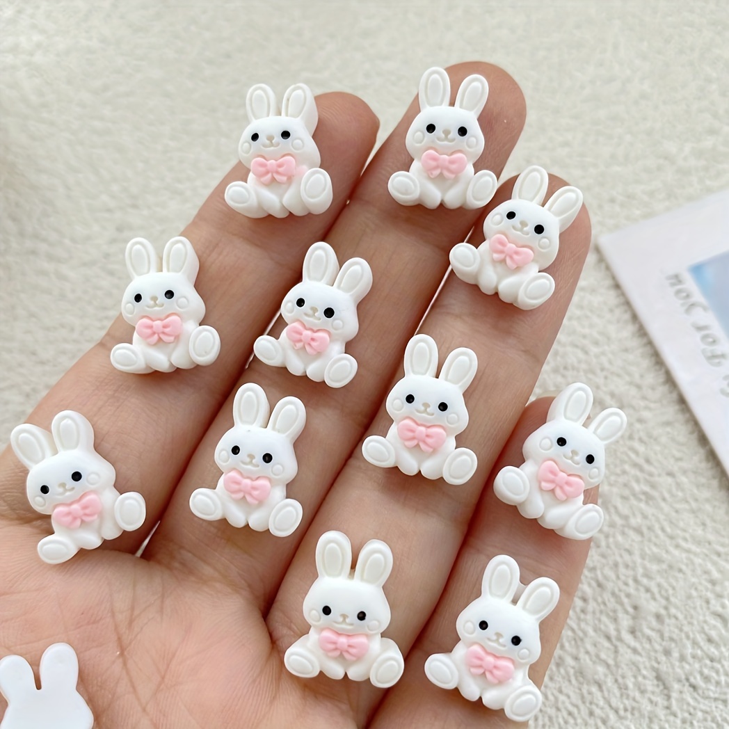 

Ensemble de 10 adorables breloques d'art des ongles en de dessin - Joli nœud et lapin en résine pour la décoration des ongles à Pâques