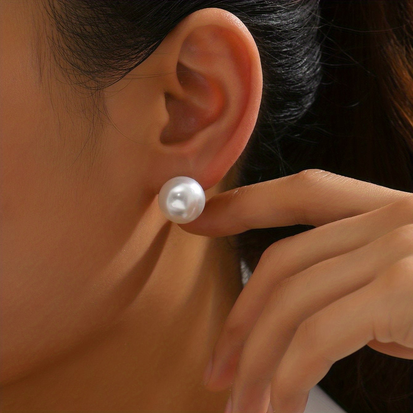 A Pair Of Minimalist And Stylish Stud Earrings.