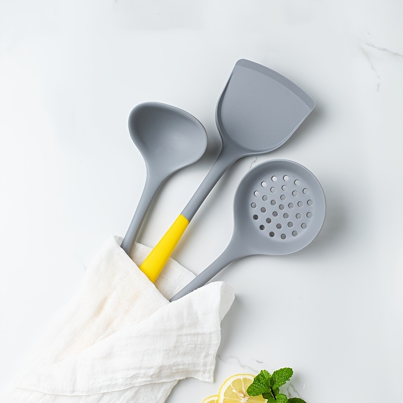 Kitchen utensils, home kitchen tools, mint rubber accessories on dark  background. Restaurant, cooking, culinary, kitchen theme. Silicone spatulas  and brushes Stock Photo by ©Magryt_Artur 441739308