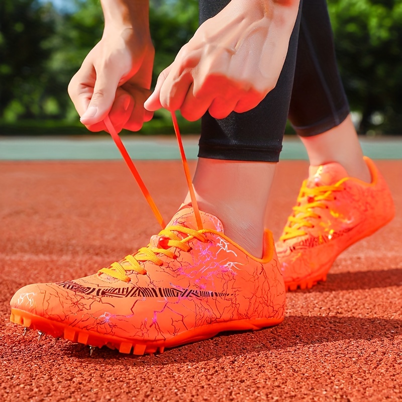 Zapatos profesionales de atletismo para hombre y mujer, ligeros, con 7  clavos, para atletismo, con suela dura de poliuretano termoplástico (color