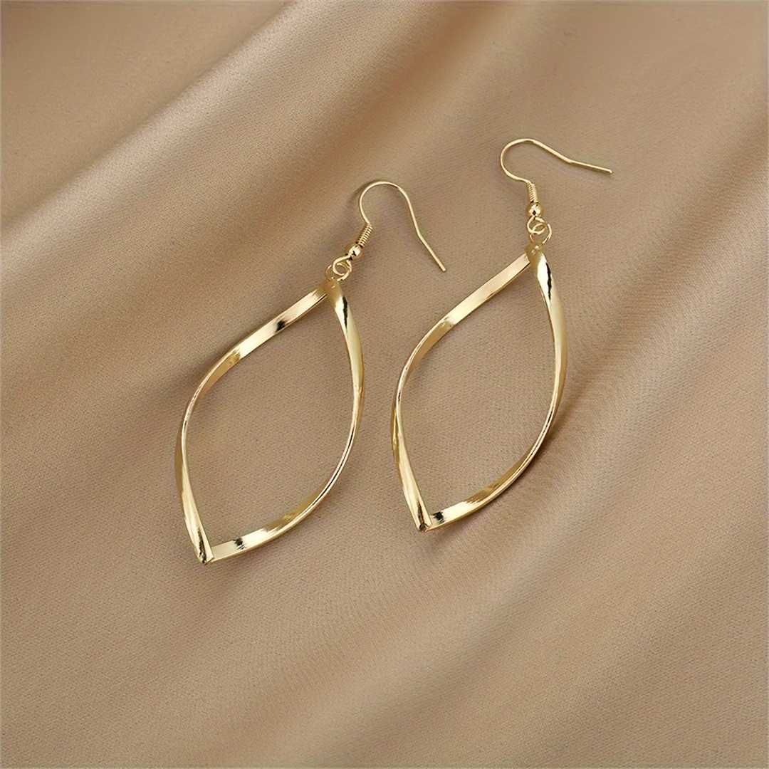 Bold Twisted Wave Dangle Earrings for Parties