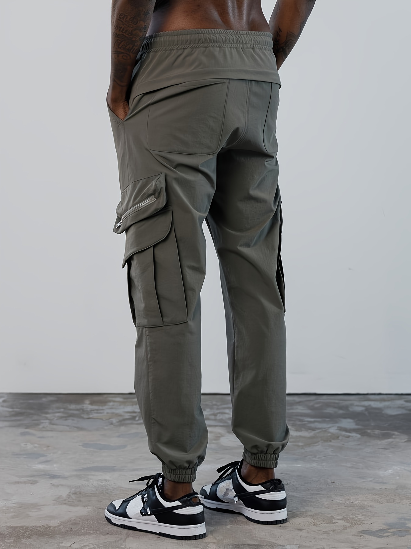 Harem pants with outlet zipper pockets