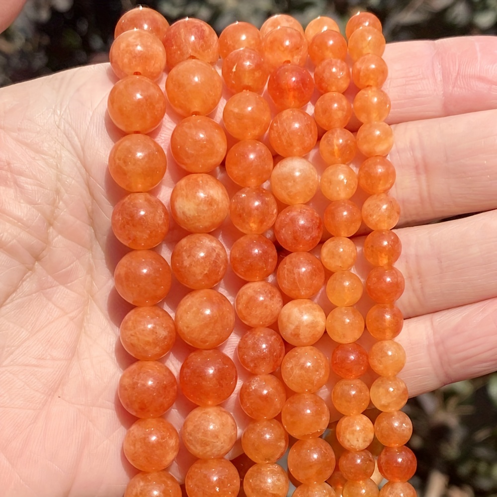 Perles pierre naturelle angélite 10mm orange/rouge