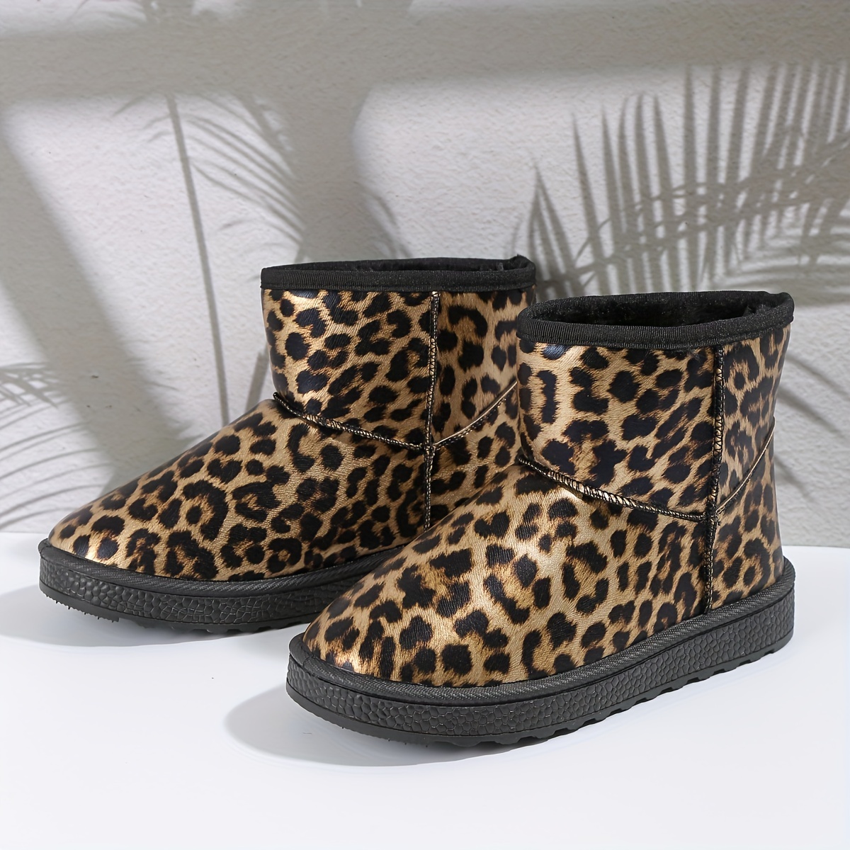 Leopard hotsell sorel boots