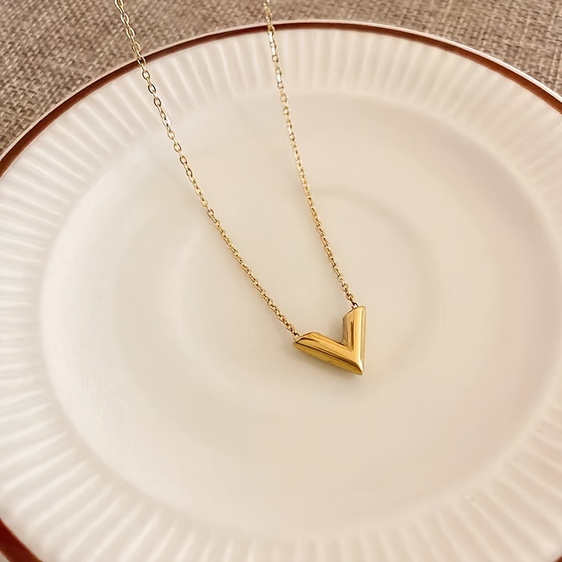 Louis Vuitton, Jewelry, Louis Vuitton Gold Essential V Necklace In Gold  Golden Brass