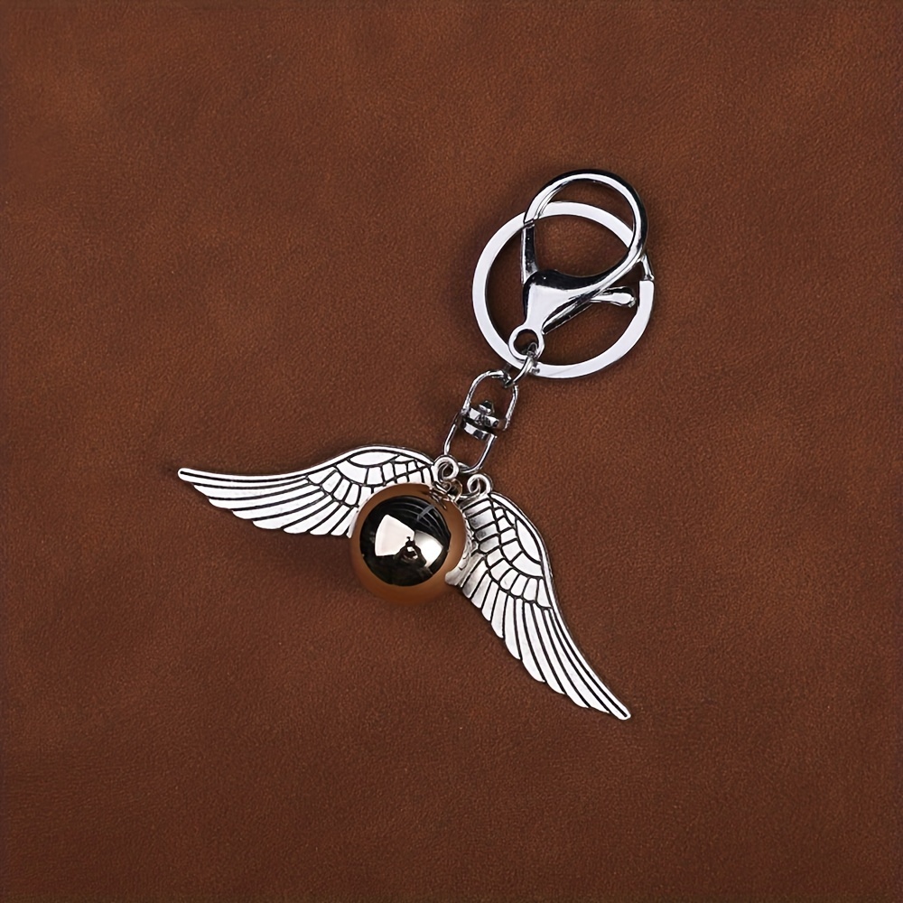 1pc Zinc Alloy Preppy Style Keyrings & Keychains With Golden Flying Thief  Keychain Film And Television Peripheral Jewelry Wings For Men's And Women's