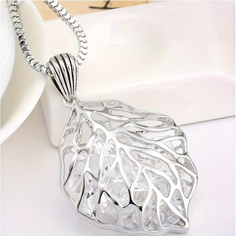 Image of Fashionable Versatile Individual Easy Long Necklace Women's Imitation Crystal Hollow Leaf Pendant Sweater Chain Accessory